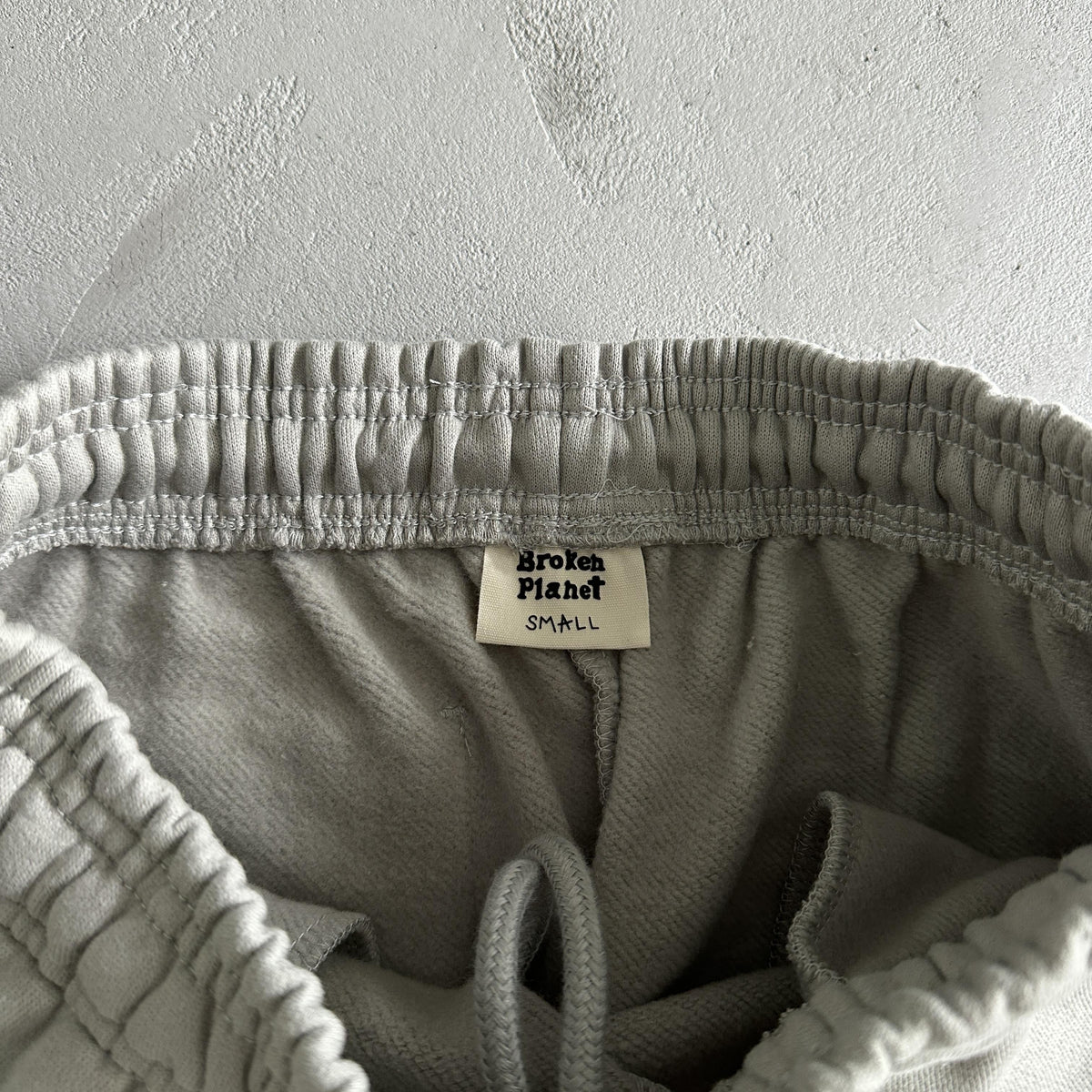 Broken P Zip Up Suit