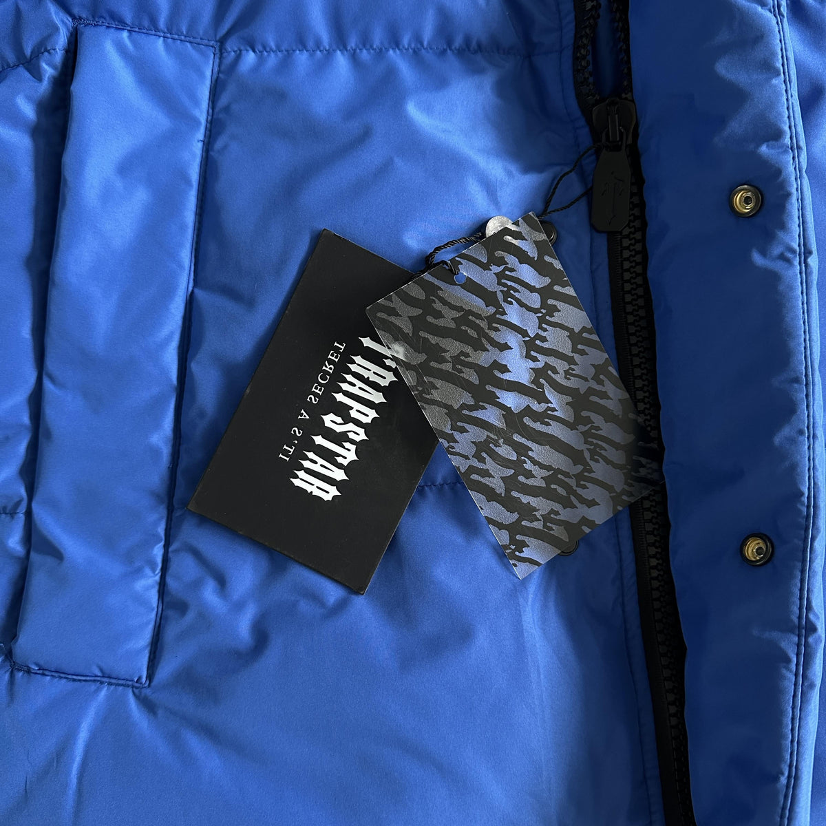 Trapstar Decoded Arch Pufferjacke Schwarz Blau