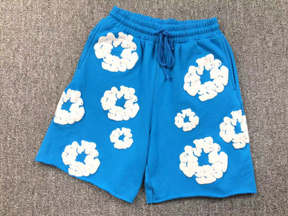 Completo corto con strappi in denim