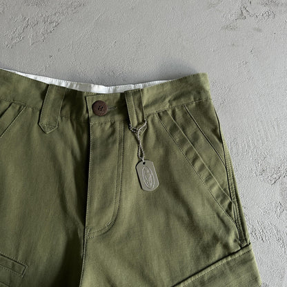 Pantaloncini Corteiz con tasca obliqua