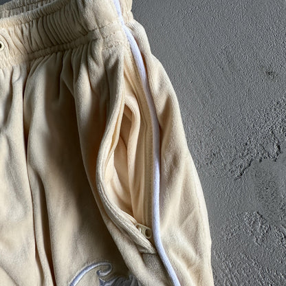 Pantaloni in velluto Corteiz color crema 