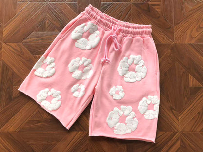 Pantaloncini con strappi in denim 