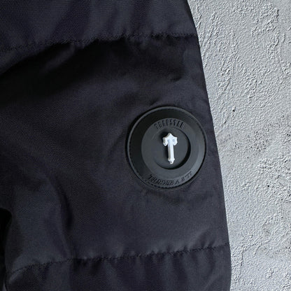 Giacca imbottita Trapstar Decoded Arch nera sfumata 