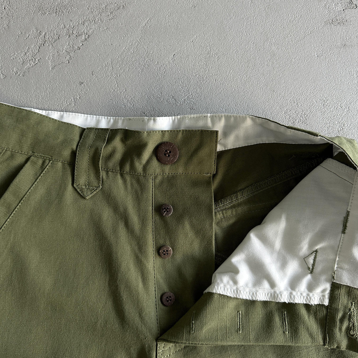 Pantaloncini Corteiz con tasca obliqua