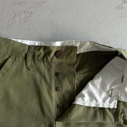 Pantaloncini Corteiz con tasca obliqua