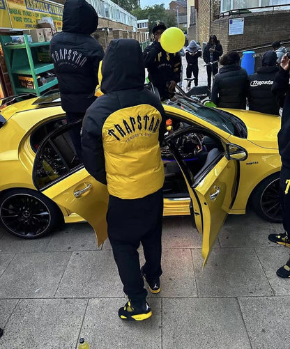 Trapstar Decoded Arch Pufferjacke Schwarz Gelb 