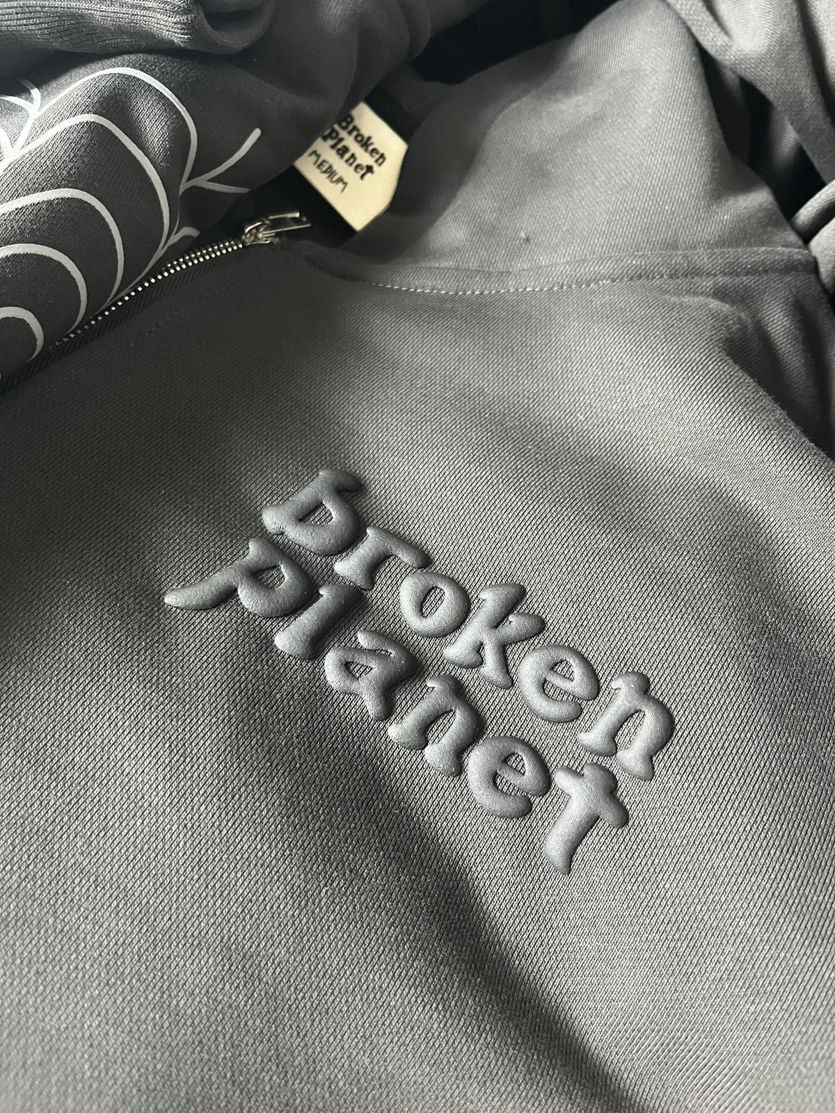 Broken Planet Spider Kapuzenjacke mit Reißverschluss 