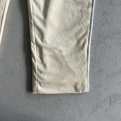 Pantaloni in velluto Corteiz color crema 