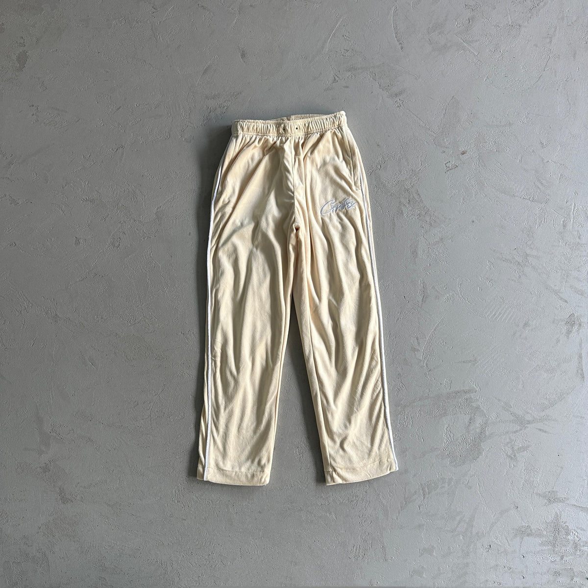 Pantaloni in velluto Corteiz color crema 