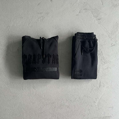 Tuta Trapstar in ciniglia decorata Black Out 