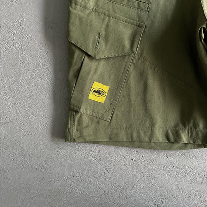 Pantaloncini Corteiz con tasca obliqua