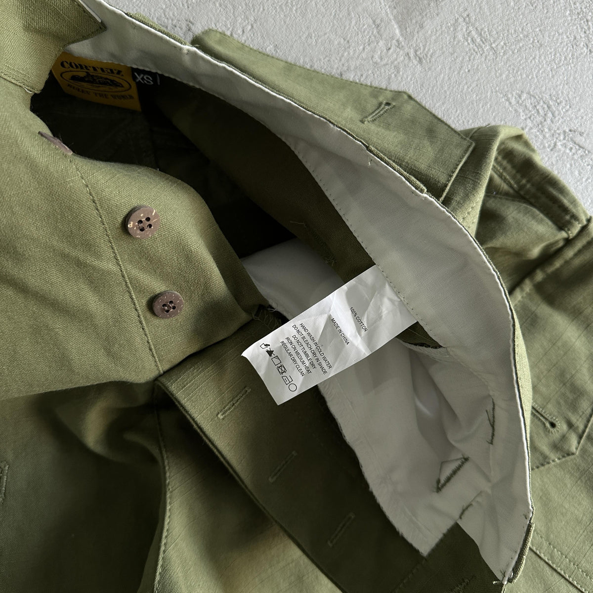 Pantaloncini Corteiz con tasca obliqua