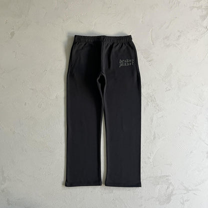 Pantaloni della tuta a gamba dritta Broken Planet neri 