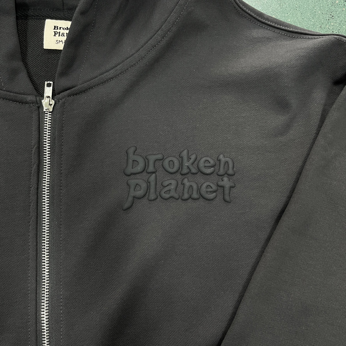 Broken Planet Spider Kapuzenjacke mit Reißverschluss 