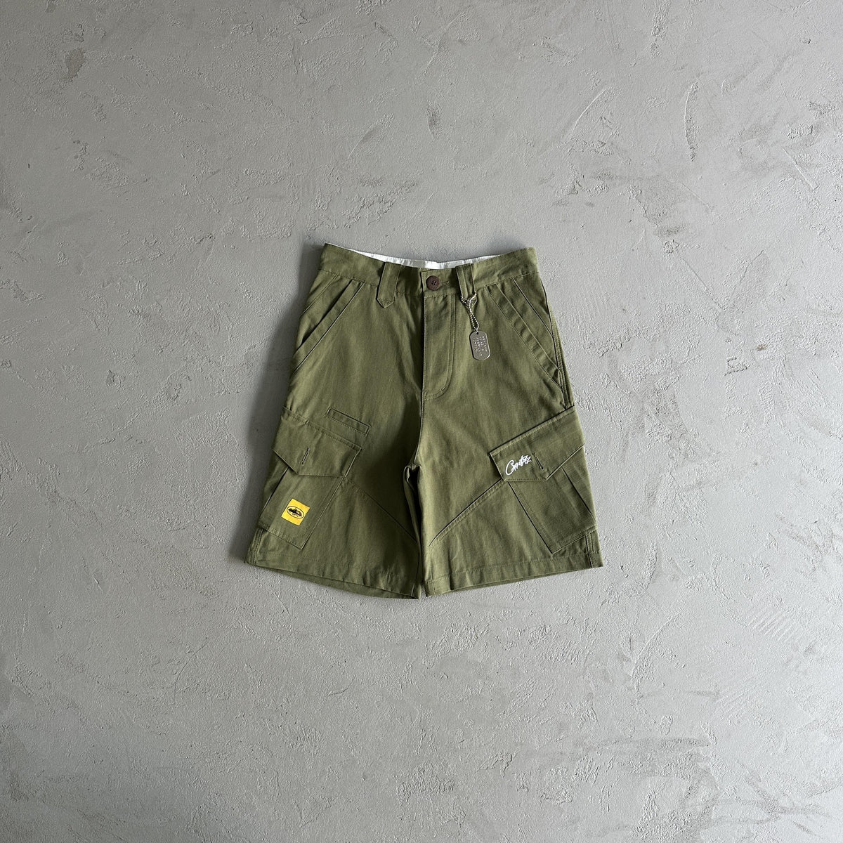 Pantaloncini Corteiz con tasca obliqua