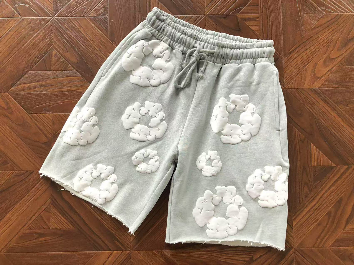 Pantaloncini con strappi in denim 