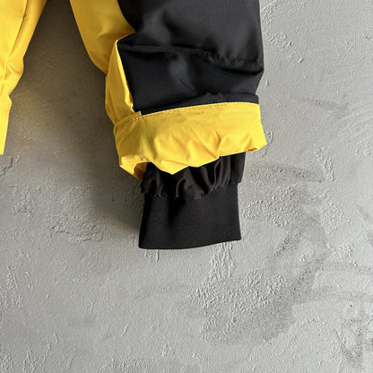 Trapstar Decoded Arch Pufferjacke Schwarz Gelb 