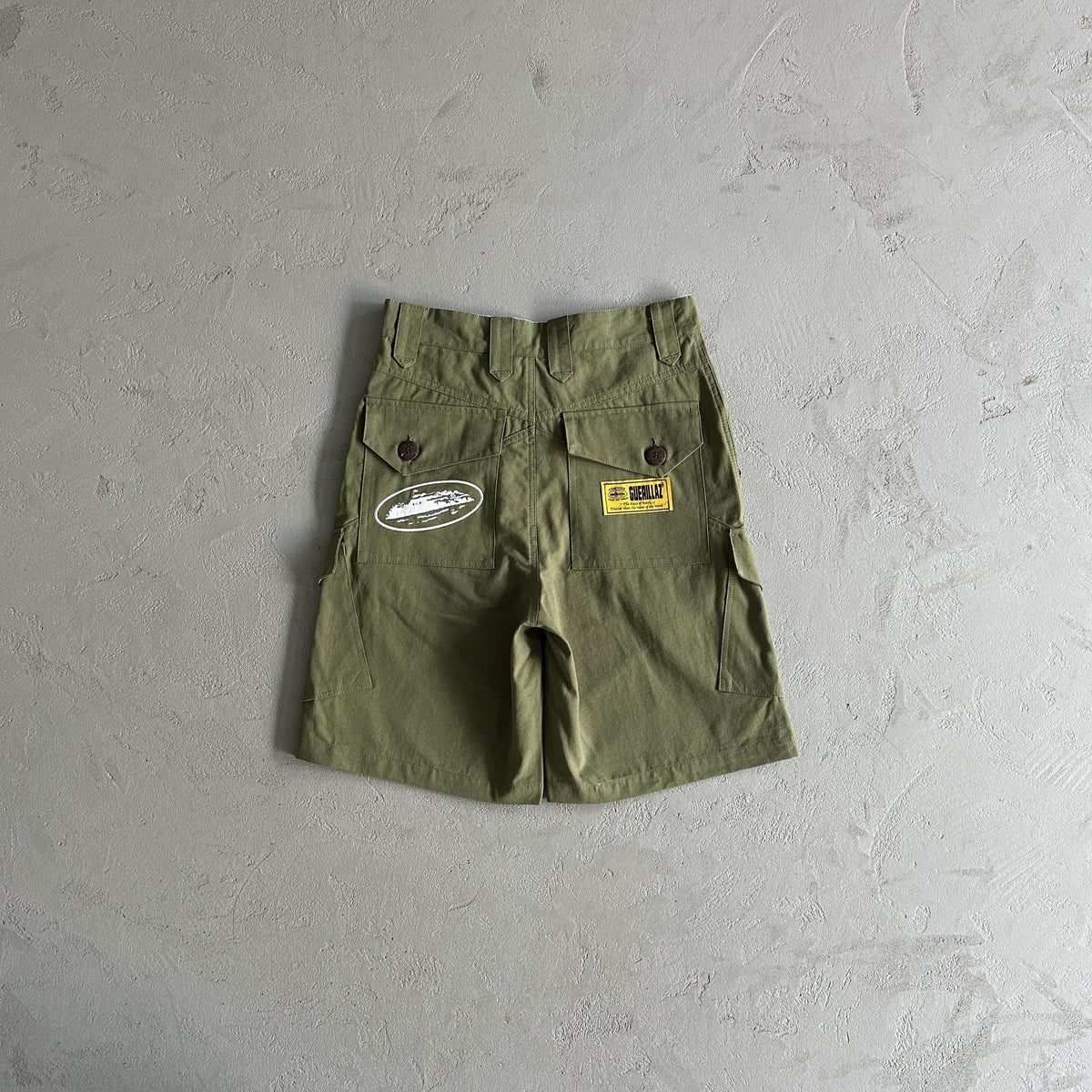 Pantaloncini Corteiz con tasca obliqua