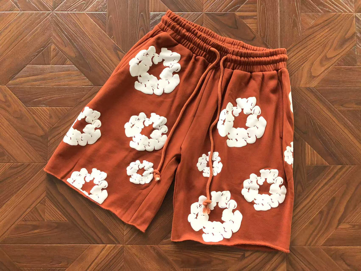 Pantaloncini con strappi in denim 